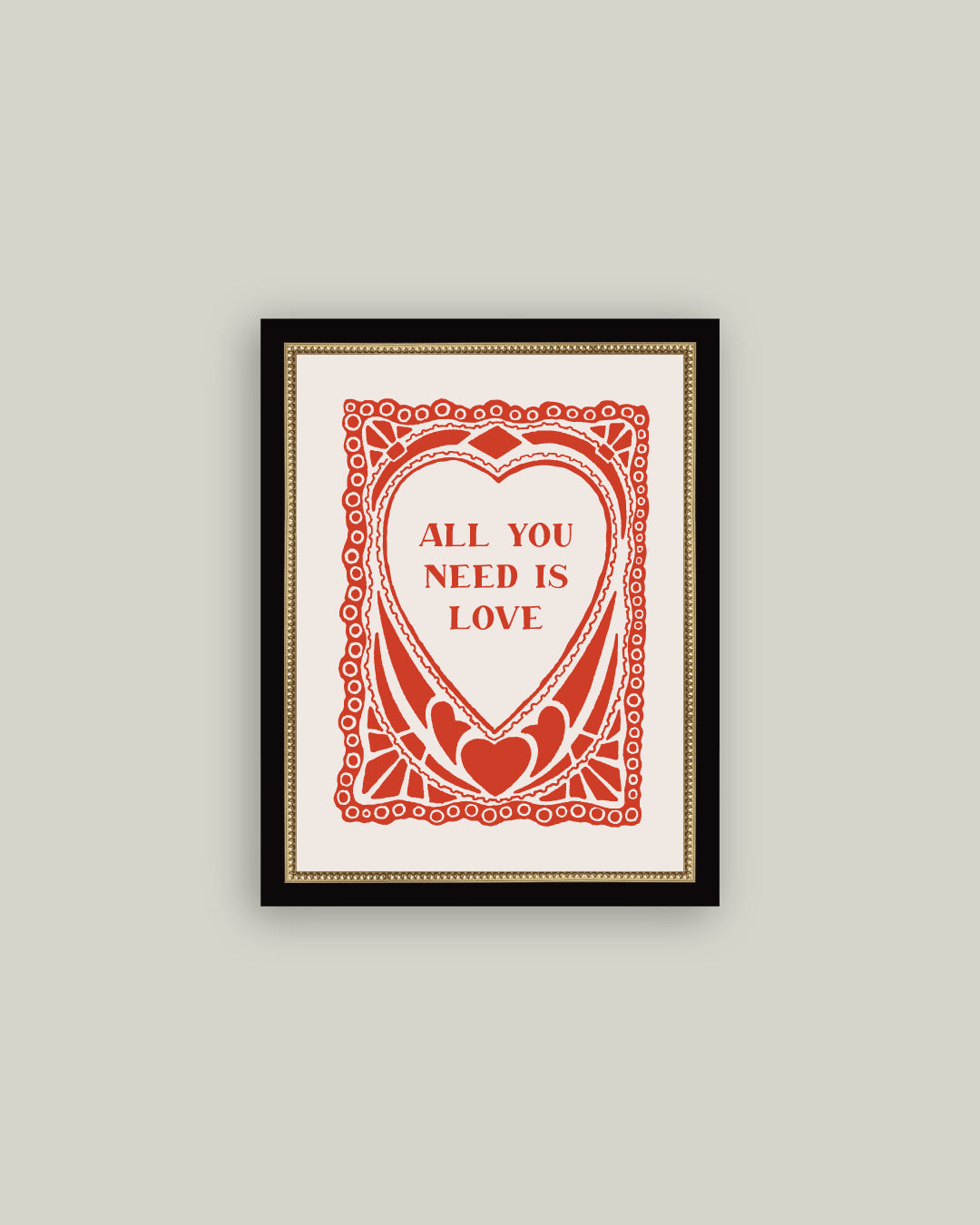 Framed poster with 'All You Need Is Love' text on a light gray background