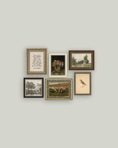Set of 6 vintage framed artworks printed on raw canvas arranged as a gallery wall