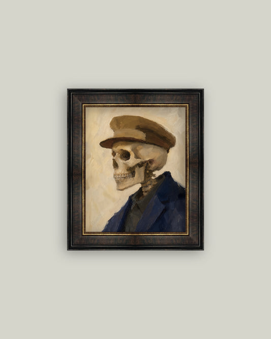 A framed portrait painting of a skeleton wearing a brown cap and dark blue jacket, set against a light beige background with a black frame and gold inner border.
